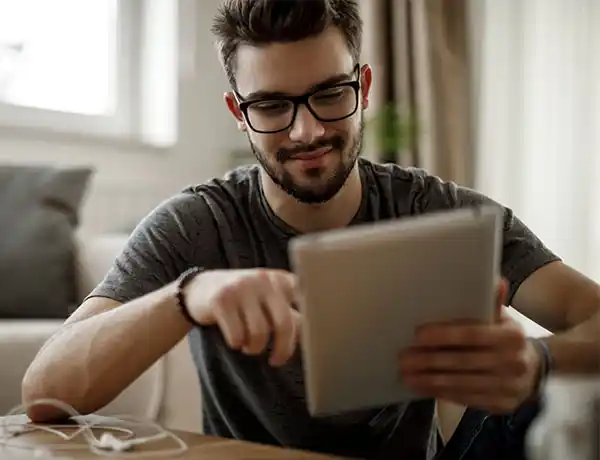 man using his ipad