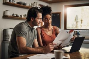 Couple reviewing papers